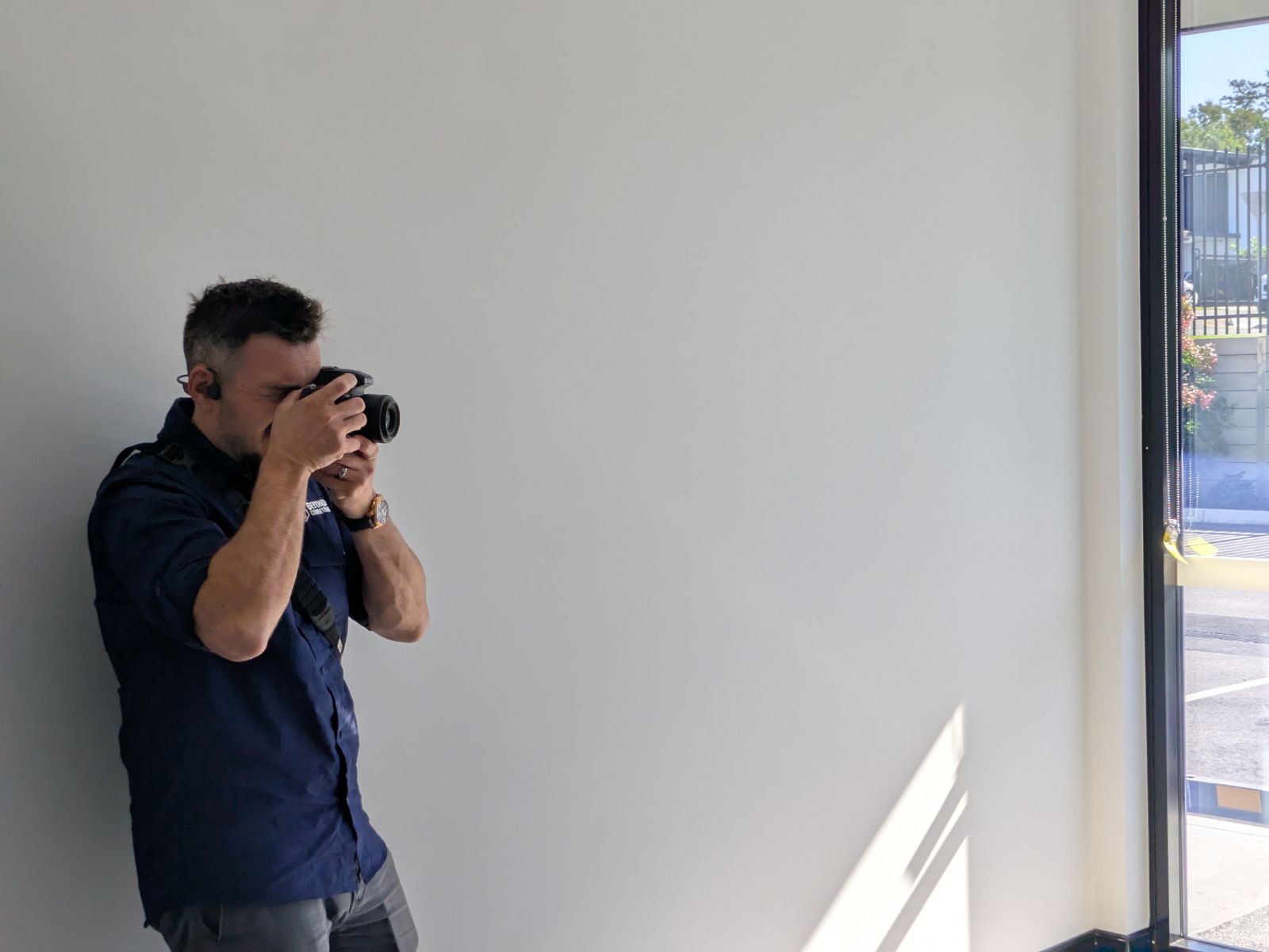 Craig MacDonald photographing on site